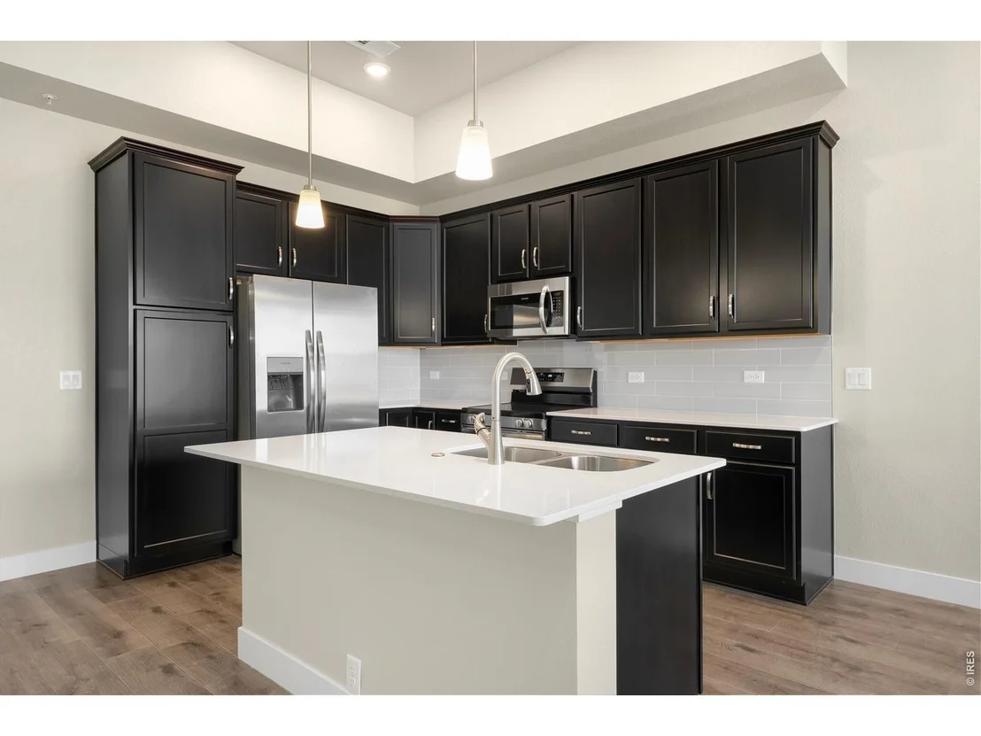 Photo of Unit 201 at 6793 Maple Leaf Dr