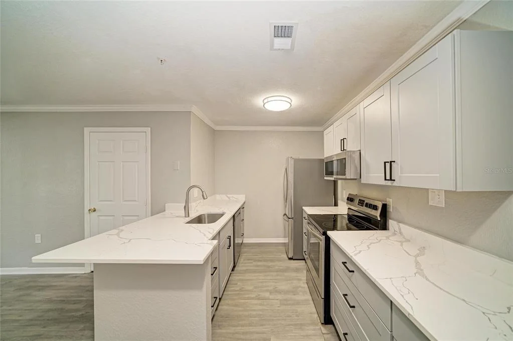 Photo of Unit 102 at 8932 MANOR LOOP