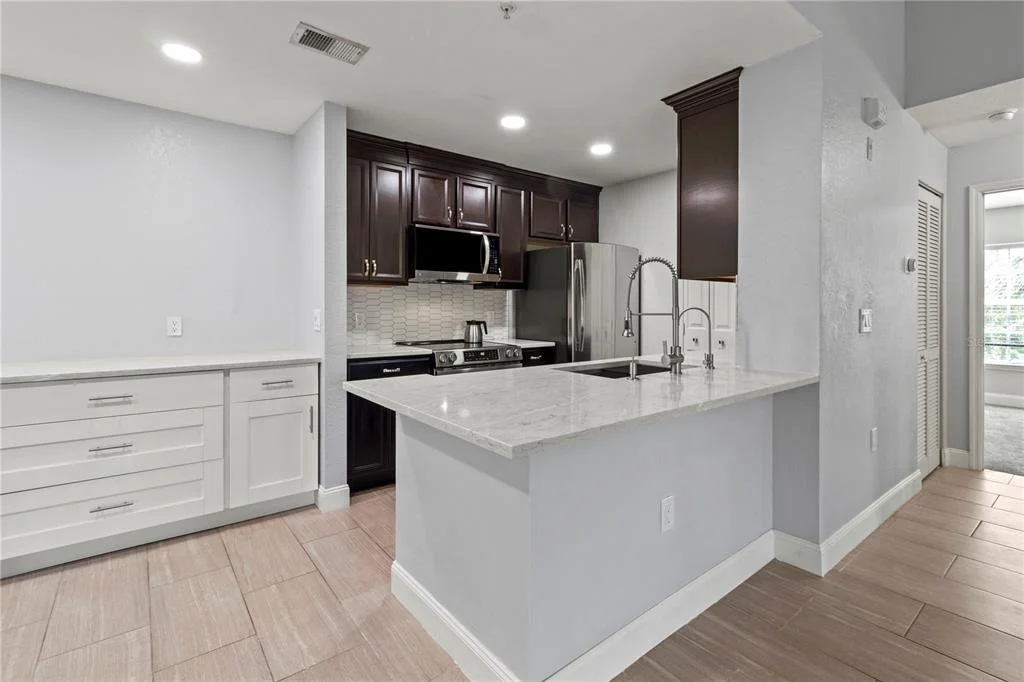 Photo of Unit 204 at 8911 MANOR LOOP