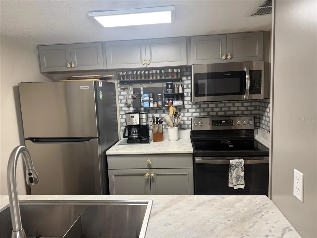 Photo of Unit H at 315 MEDALLION BOULEVARD