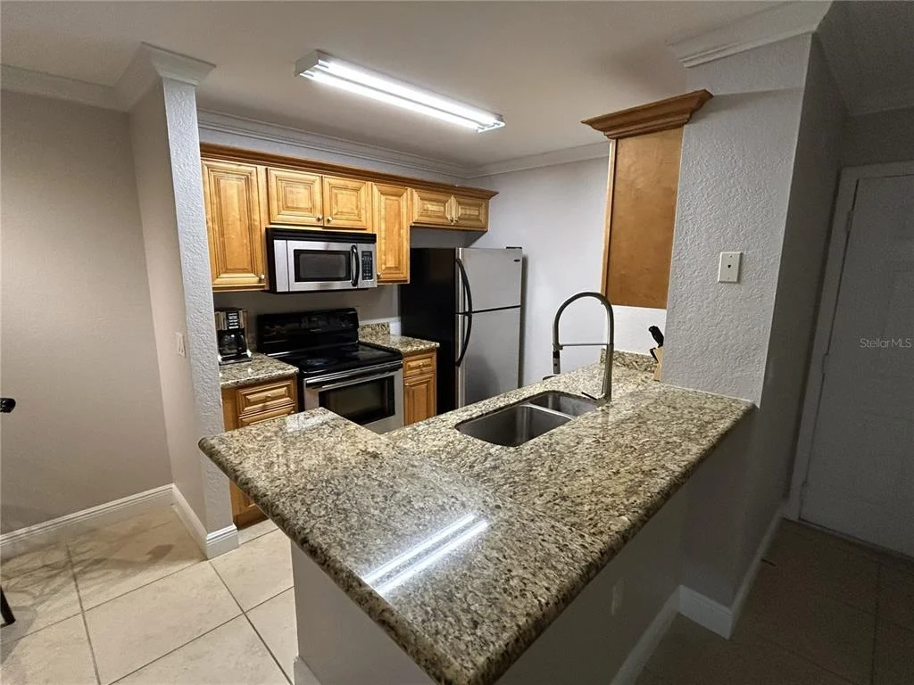 Photo of Unit 102 at 8926 MANOR LOOP