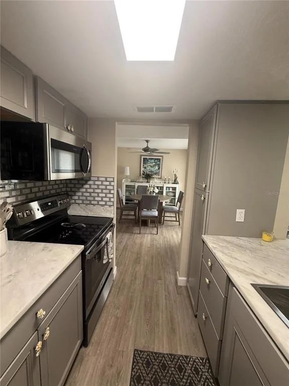 Photo of Unit H at 315 MEDALLION BOULEVARD