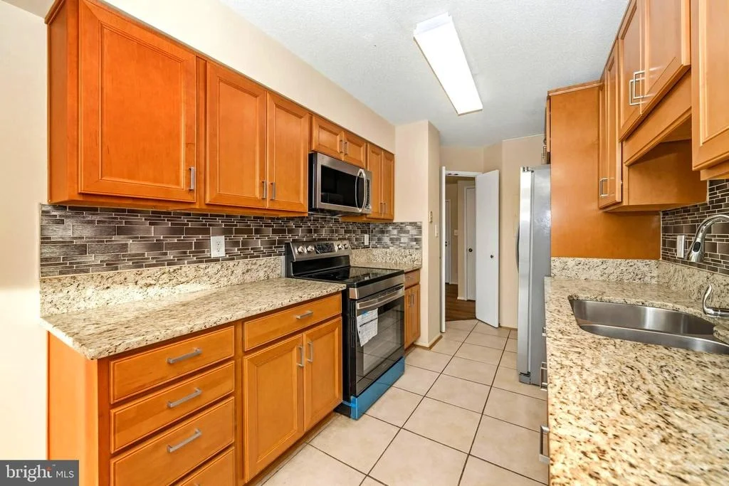 Photo of Unit 3621 at 15115 INTERLACHEN DR
