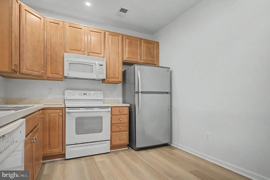 Photo of Unit 208 at 8612 FLUTTERING LEAF TRAIL