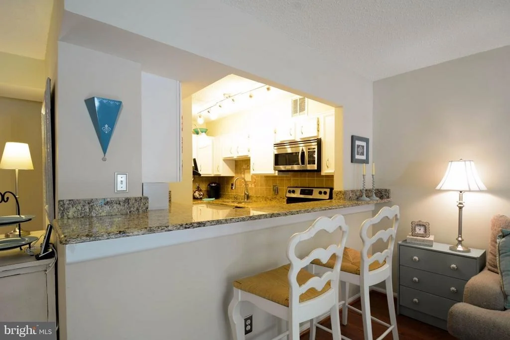Photo of Unit 107 at 5903 MOUNT EAGLE DRIVE