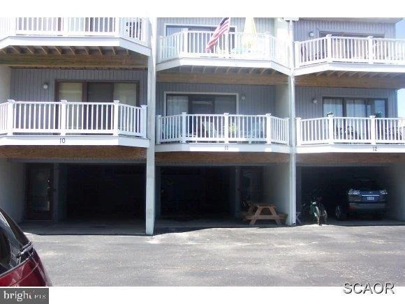 Photo of Unit 11 at 11 BEACH PEBBLE SQUARE