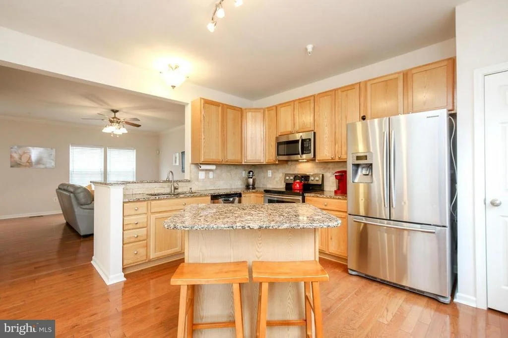 Photo of Unit 107 at 6884 TASKER FALLS
