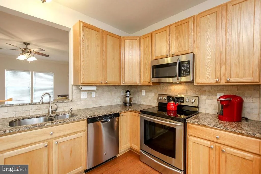 Photo of Unit 107 at 6884 TASKER FALLS
