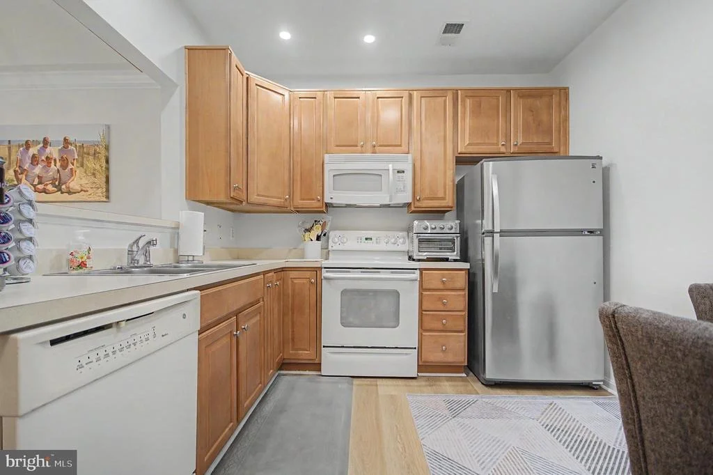 Photo of Unit 208 at 8612 FLUTTERING LEAF TRAIL