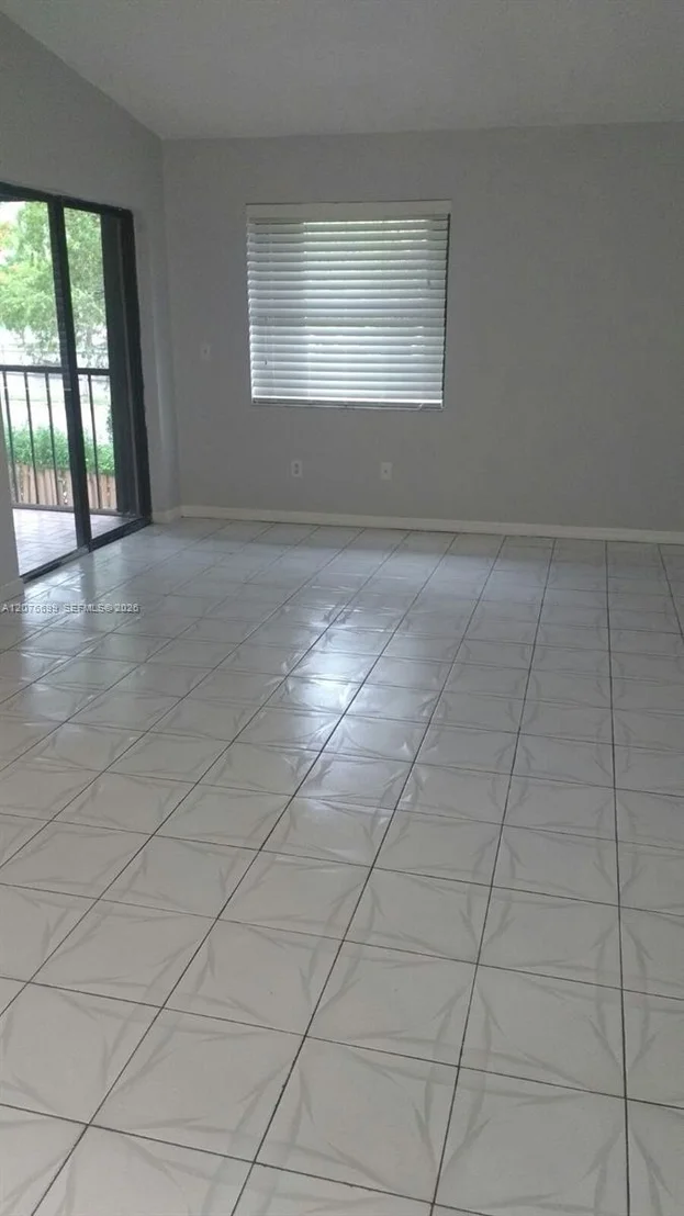 Photo of Unit 202 at 9810 Hammocks Blvd