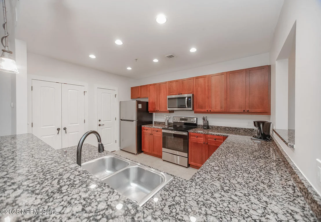 Photo of Unit 309 at 945 REGISTRY Boulevard