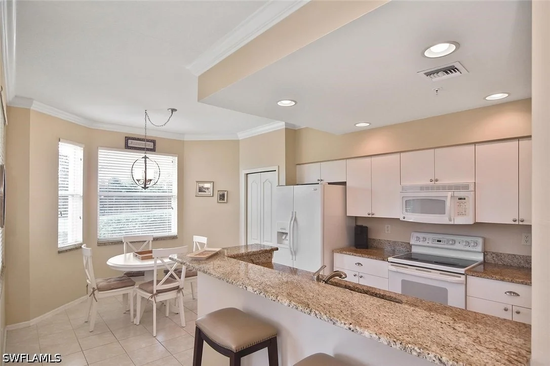 Photo of Unit 122 at 8680 CEDAR HAMMOCK Circle