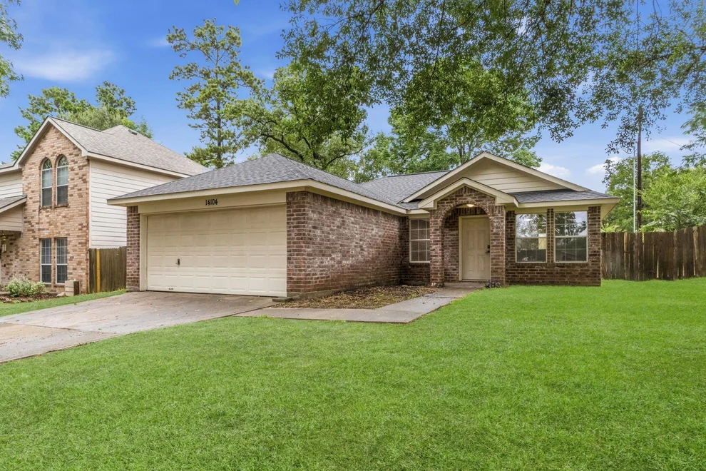 Unit for sale at 14104 Running Bear Drive, Willis, TX 77378