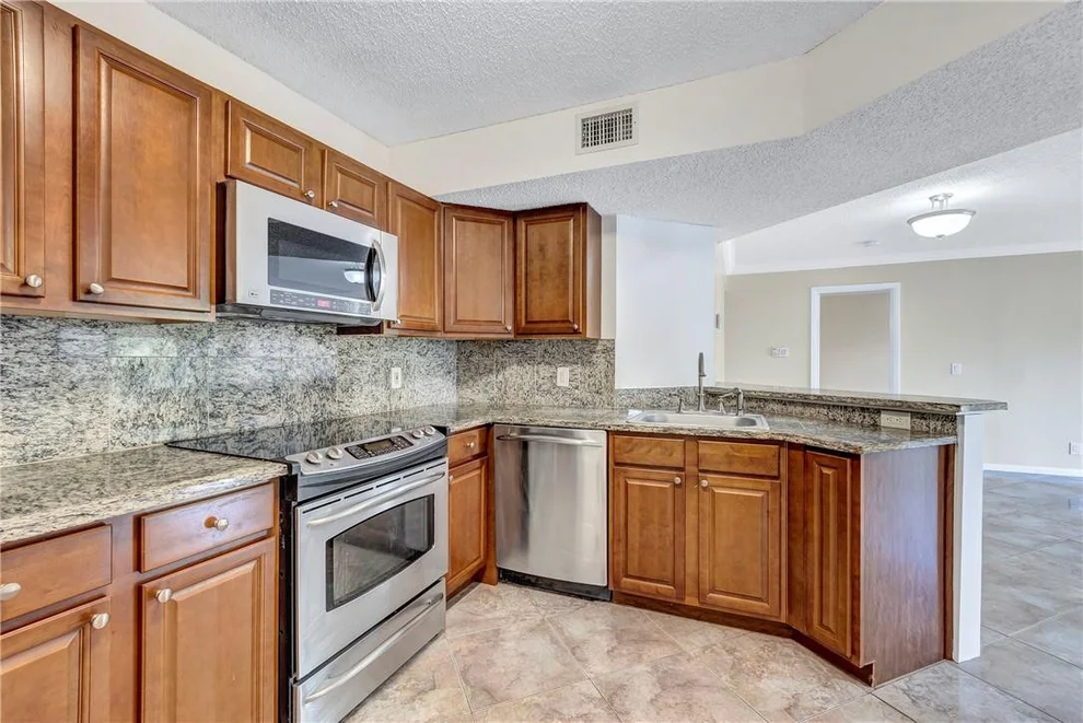 Unit for sale at 8901 Wiles Road, Coral Springs, FL 33067