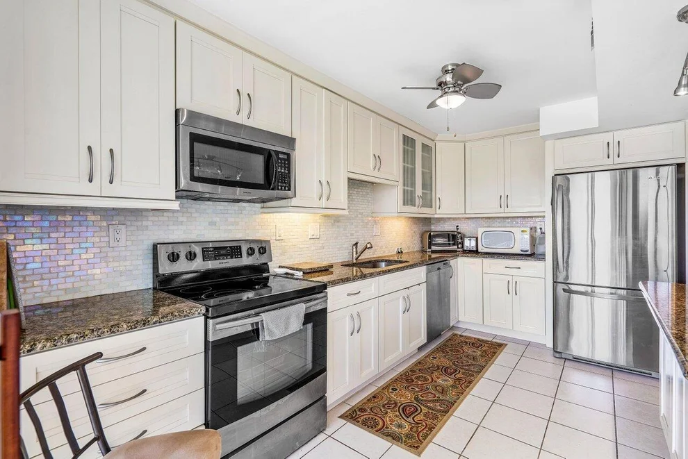 Unit for sale at 5380 Woodland Lakes Drive, Palm Beach Gardens, FL 33418