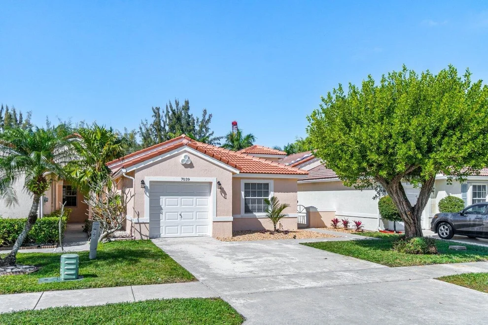 Unit for sale at 7039 Burgess Drive, Lake Worth, FL 33467