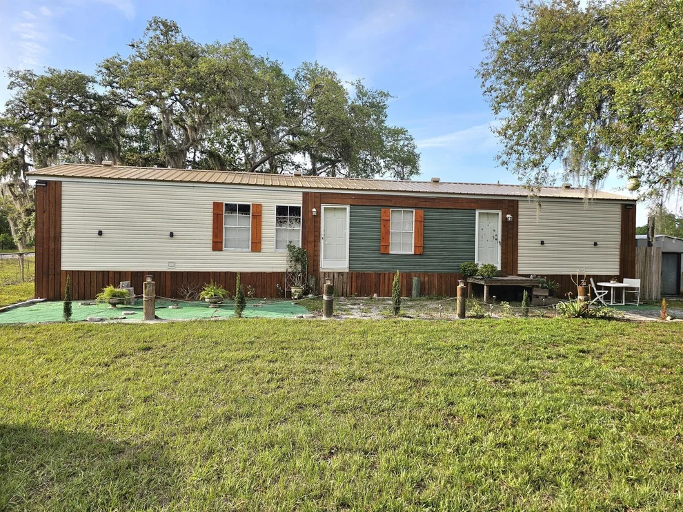 Unit for sale at 32212 NE 4th Drive, Okeechobee, FL 34972