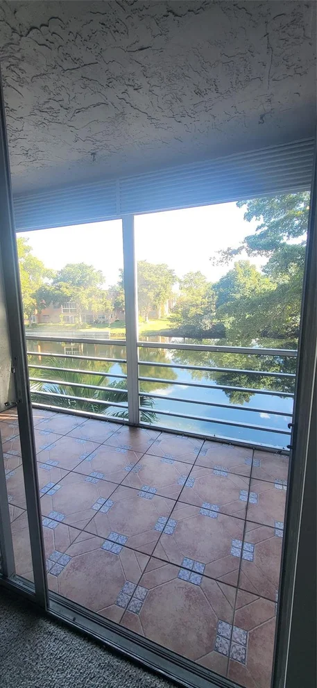 Unit for sale at 9070 Lime Bay Boulevard, Tamarac, FL 33321