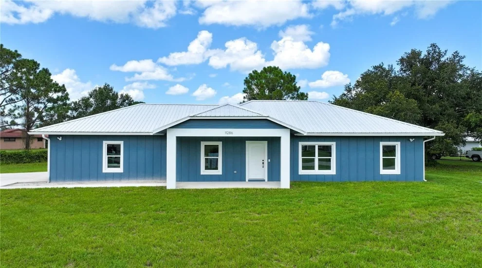 Unit for sale at 11286 NE 3rd Circle, Okeechobee, FL 34972