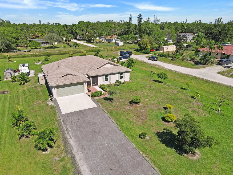 Unit for sale at 11547 41st Court N, The Acreage, FL 33411
