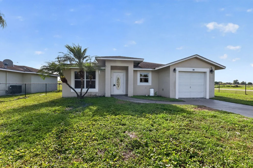 Unit for sale at 138 Dabou Loop, Belle Glade, FL 33430