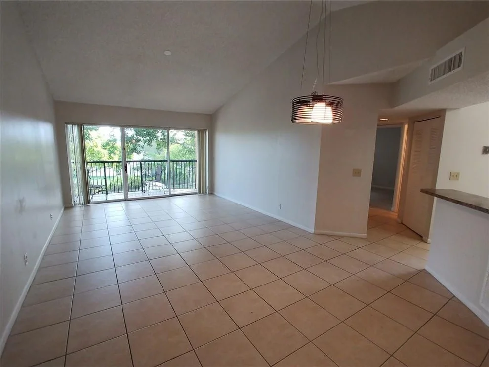 Unit for sale at 8721 Wiles Road, Coral Springs, FL 33067