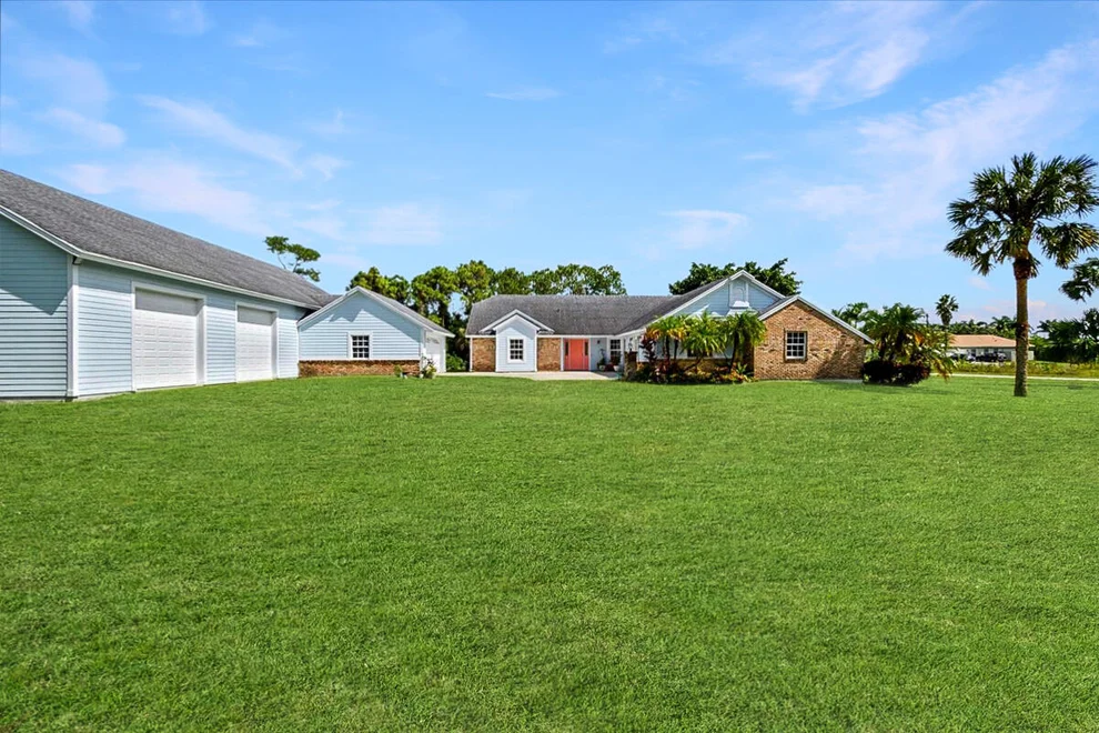 Unit for sale at 9118 170th Avenue N, The Acreage, FL 33470