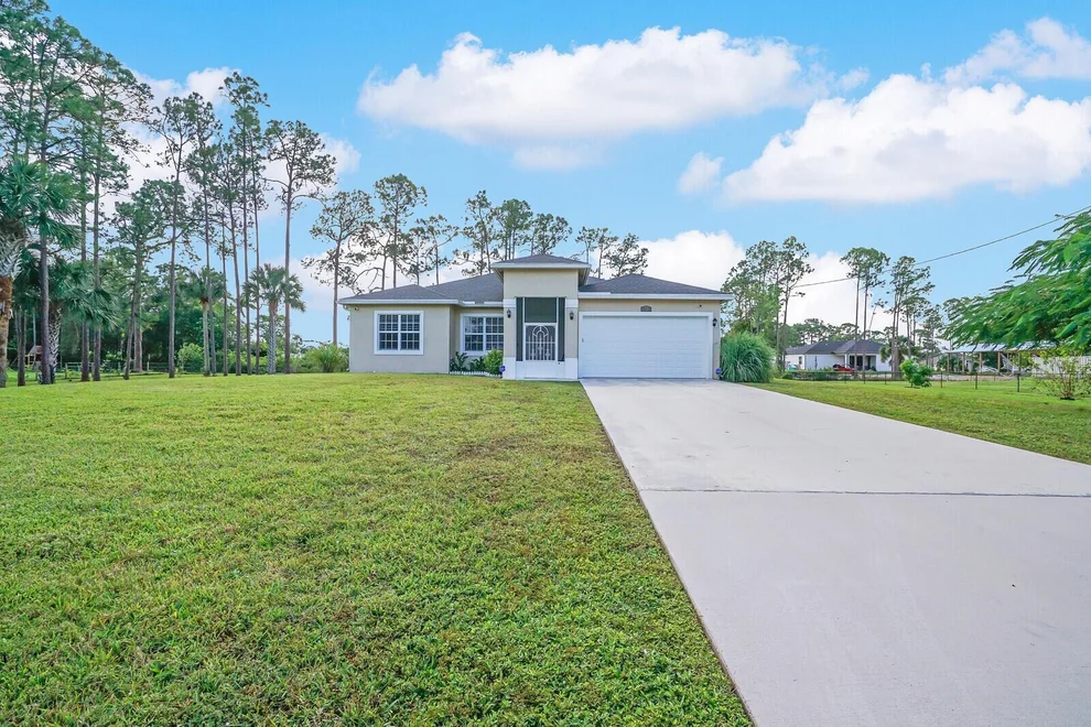 Unit for sale at 18672 91st Place N, The Acreage, FL 33470