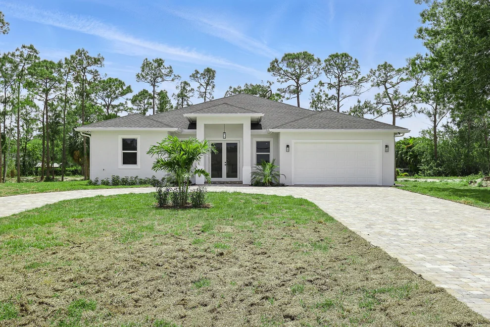 Unit for sale at 17882 32nd Lane N, The Acreage, FL 33470