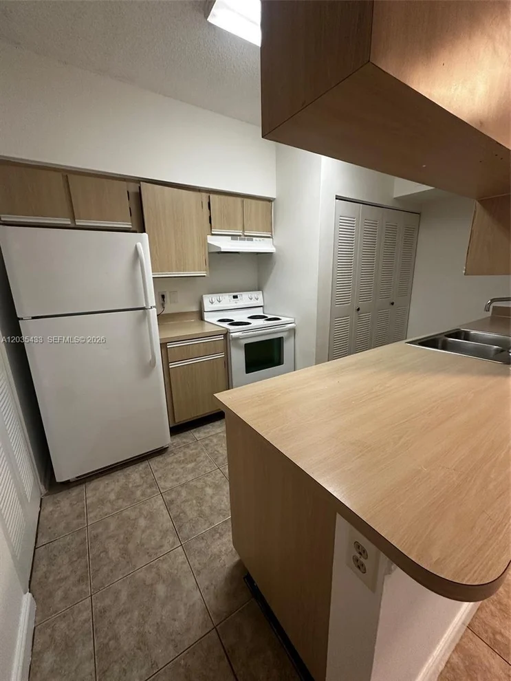 Unit for sale at 18356 NW 68th Ave, Hialeah, FL 33015