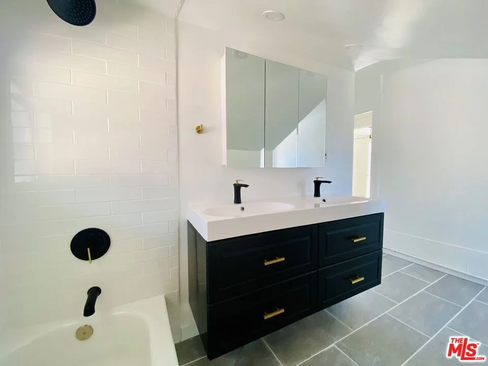 Unit for sale at 1474 W Vernon Avenue, Los Angeles, CA 90062