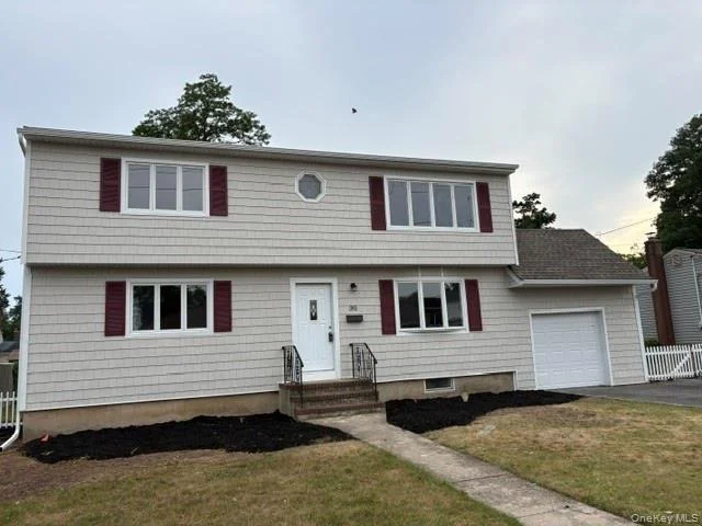 Unit for sale at 381 N Clinton Avenue, Babylon, NY 11757