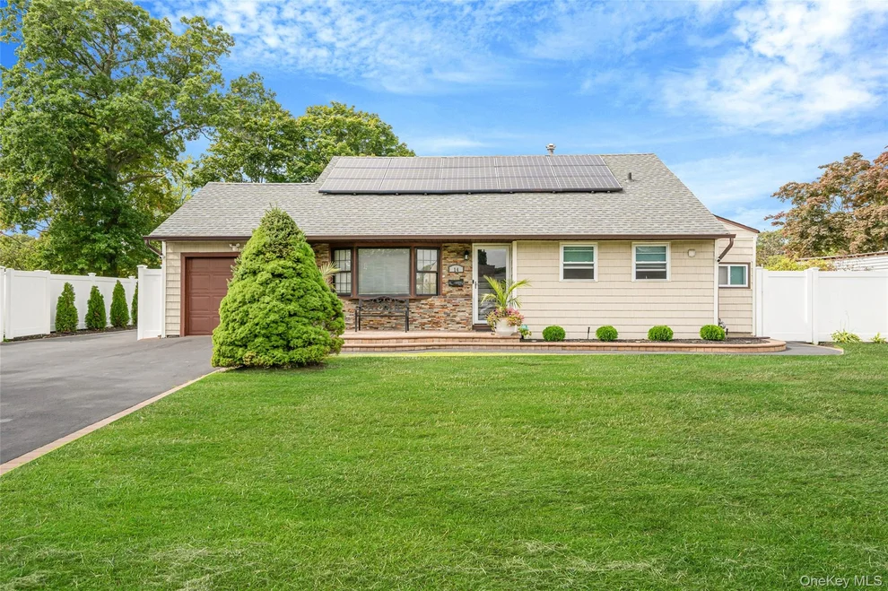 Unit for sale at 14 Dartmouth Drive, Islip, NY 11706