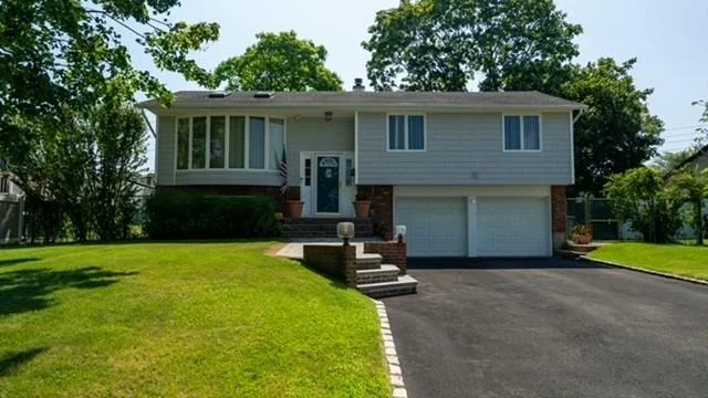 Unit for sale at 81 Country Village Lane, Islip, NY 11730