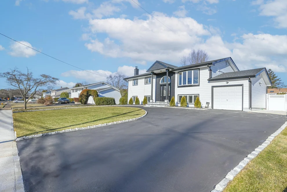 Unit for sale at 153 Ridge Road, Babylon, NY 11798