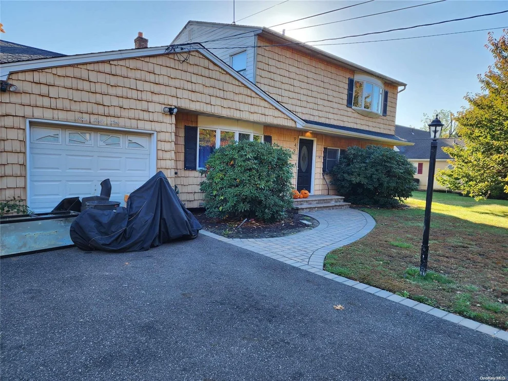 Unit for sale at 949 Sycamore Avenue, Islip, NY 11716