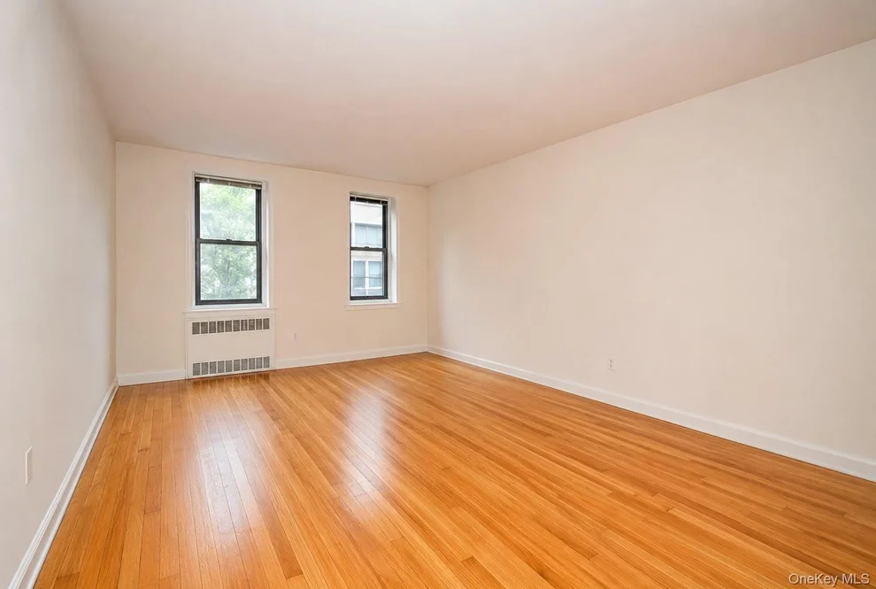 Unit for sale at 99-63 66 Avenue, New York, NY 11374