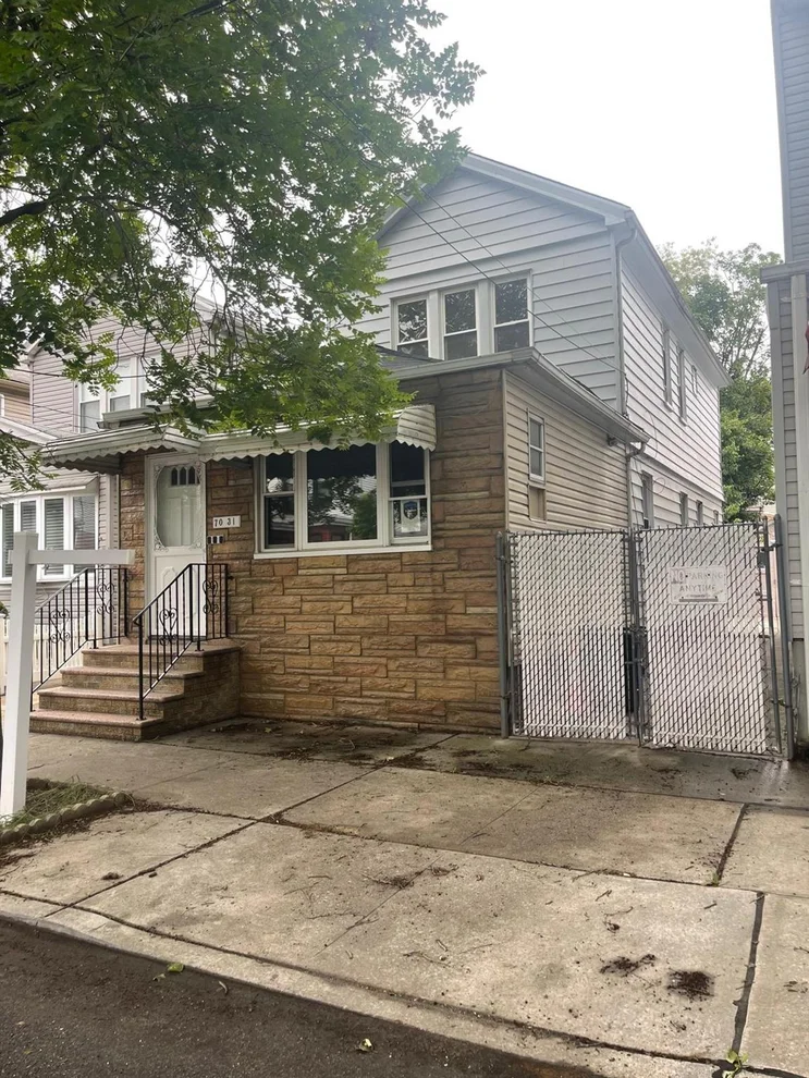Unit for sale at 70-31 71 Place, New York, NY 11385
