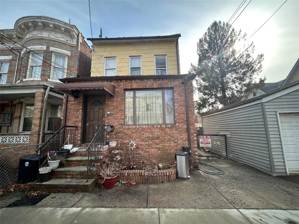 Unit for sale at 76-12 85th Drive, New York, NY 11421