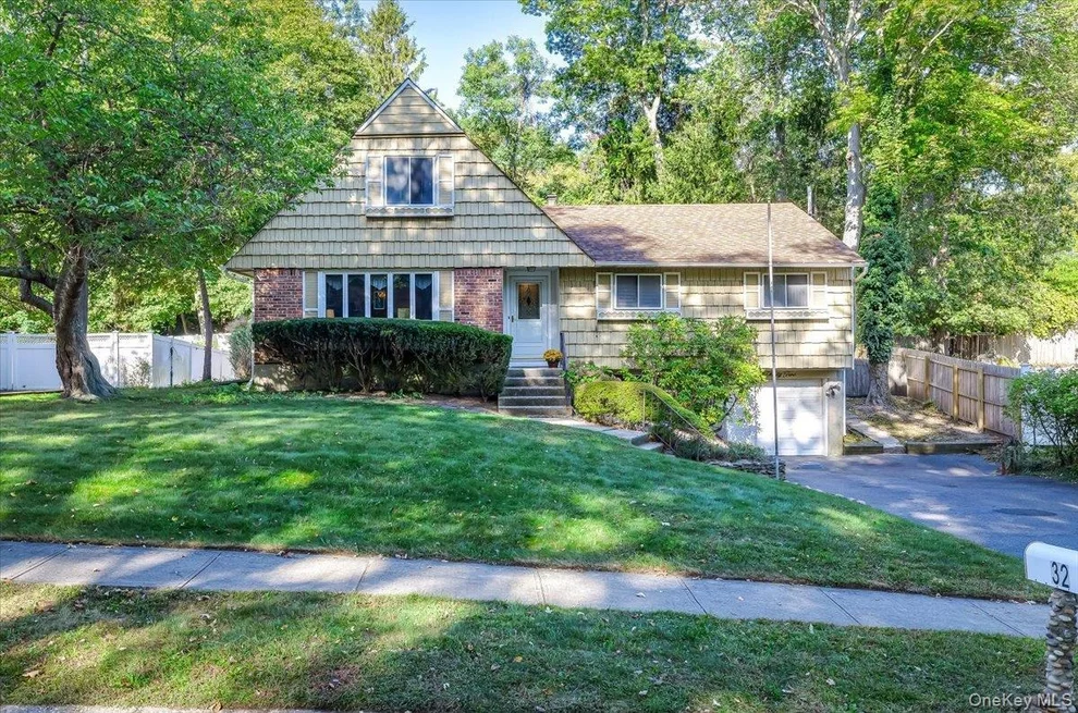 Unit for sale at 32 Ravenwood Drive, Smithtown, NY 11754