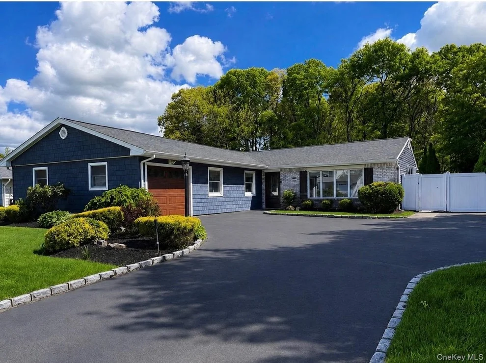 Unit for sale at 66 Singingwood Drive, Islip, NY 11741
