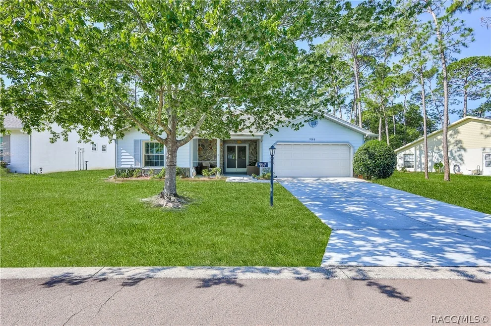 Unit for sale at 7088 Crown Oaks Drive, Spring Hill, FL 34606
