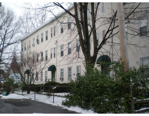 Unit for sale at 11 Faxon St, Newton, MA 02458