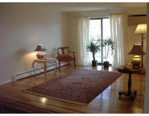 Unit for sale at 12 Pond Lane, Arlington, MA 02474