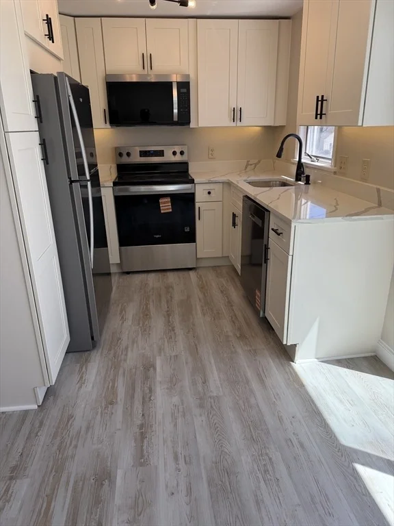 Unit for sale at 23 Victoria Heights Road, Boston, MA 02136