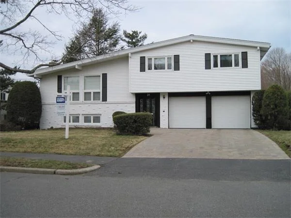 Unit for sale at 21 Esty Farm Road, Newton, MA 02459