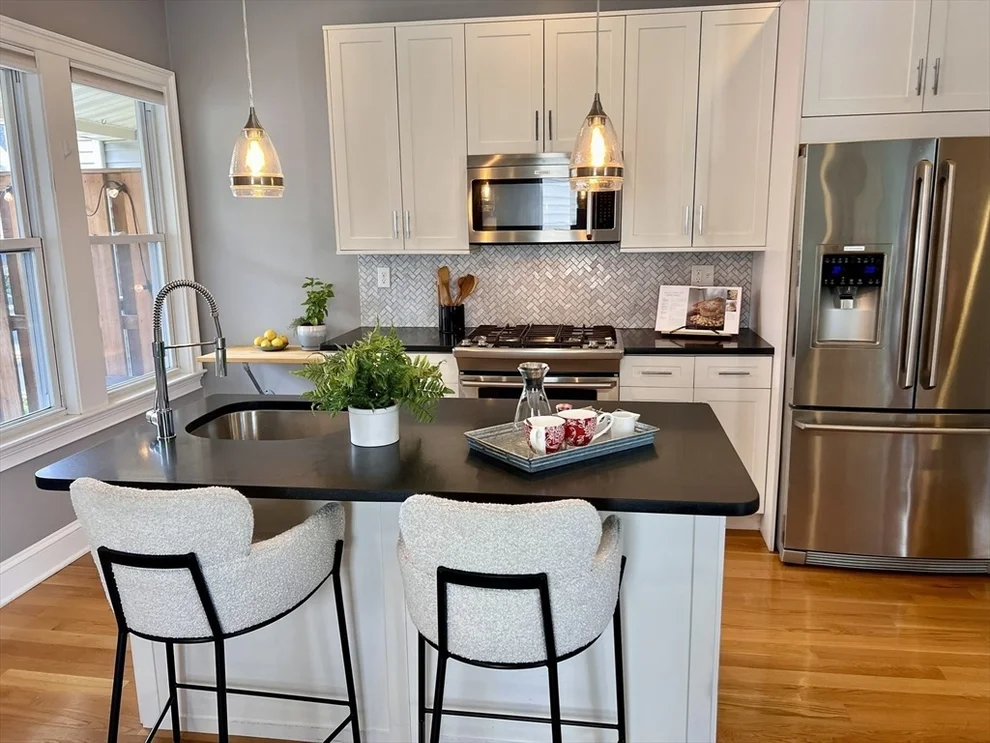 Unit for sale at 12-14 Pitman, Somerville, MA 02144