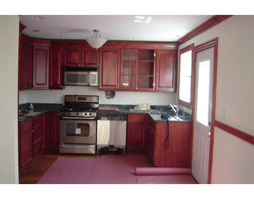 Unit for sale at 215 Florence Street, Boston, MA 02131