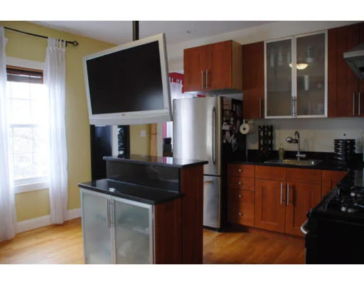 Unit for sale at 12-14 Everett, Boston, MA 02134