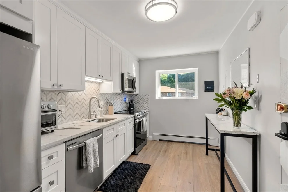 Unit for sale at 23 Westgate Rd, Boston, MA 02467